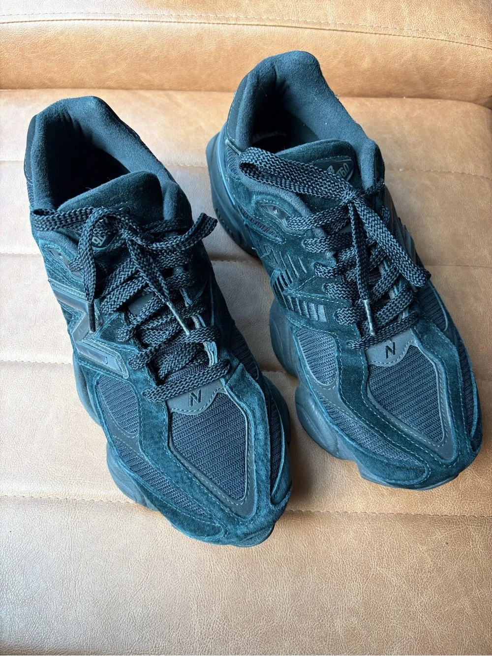 New Balance 9060 sneakers in a Triple Black colorway